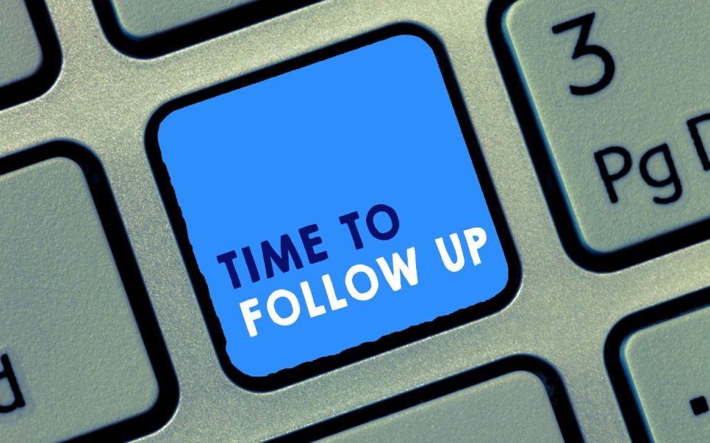 Lead follow-up - A computer keyboard with a blue key that reads "TIME TO FOLLOW UP" replacing one of the regular keys.
