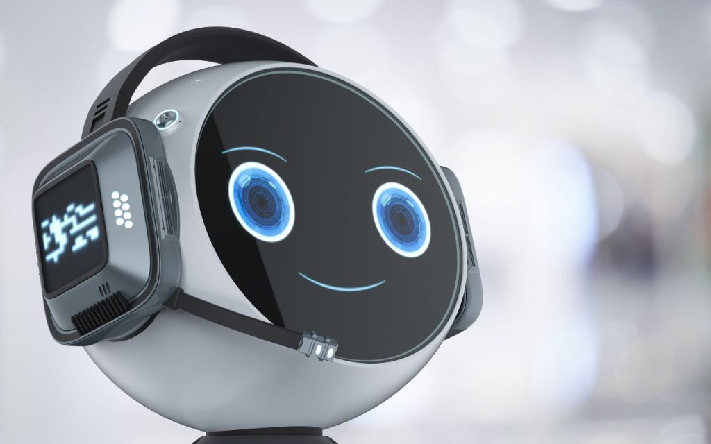 A round robot with a digital face displaying blue eyes and a smile, wearing headphones, is shown against a blurred background.